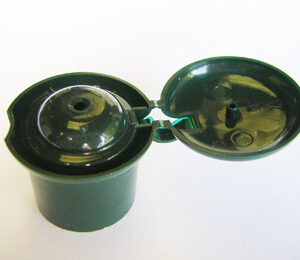 An example of a SNXFT 73 flip top small dosage container tops manufactured by ScopeNext