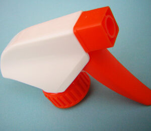 Example of a SNXT 105 Industrial Trigger sprayer head for chemicals and solvents diagonal side view with red details