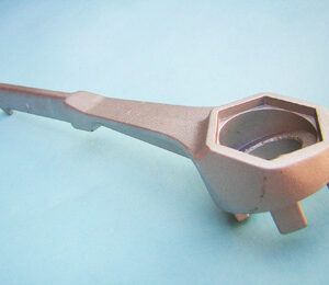 An example of a Drum wrench from ScopeNext in a grey plastic for Drum tap fitting to drums, barrels and large containers.